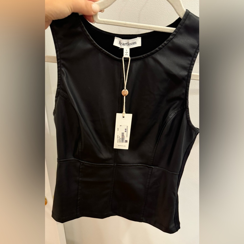 Faux leather sleeveless crewneck blouse
